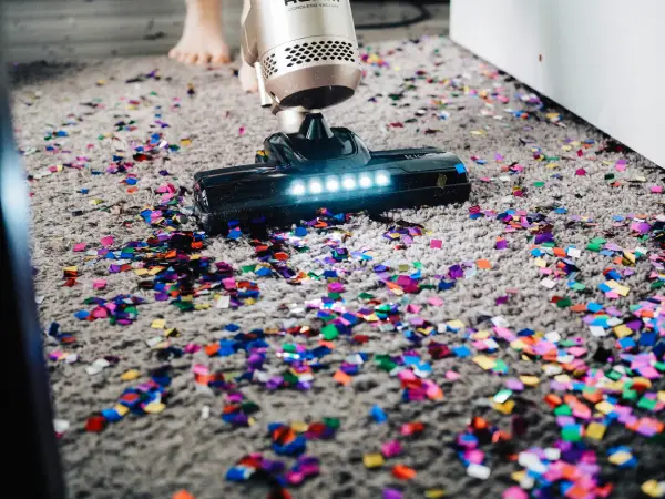 vacuum picking up confetti